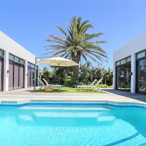 Ocean Breeze Sunset Apartment